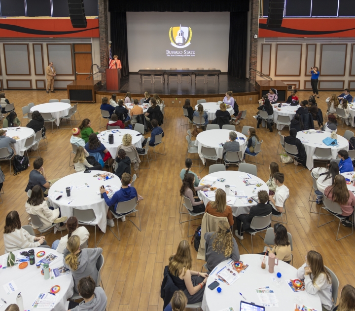 Attendees at the Careers in Education conference watch presentation