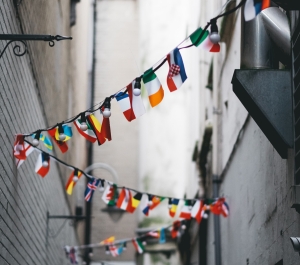 Bunting of international flags in an alley