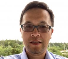 Head shot of Gang "Gary" Hu