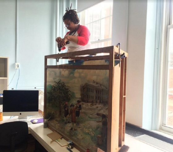 LaStarsha McGarity, '19, working on the diorama