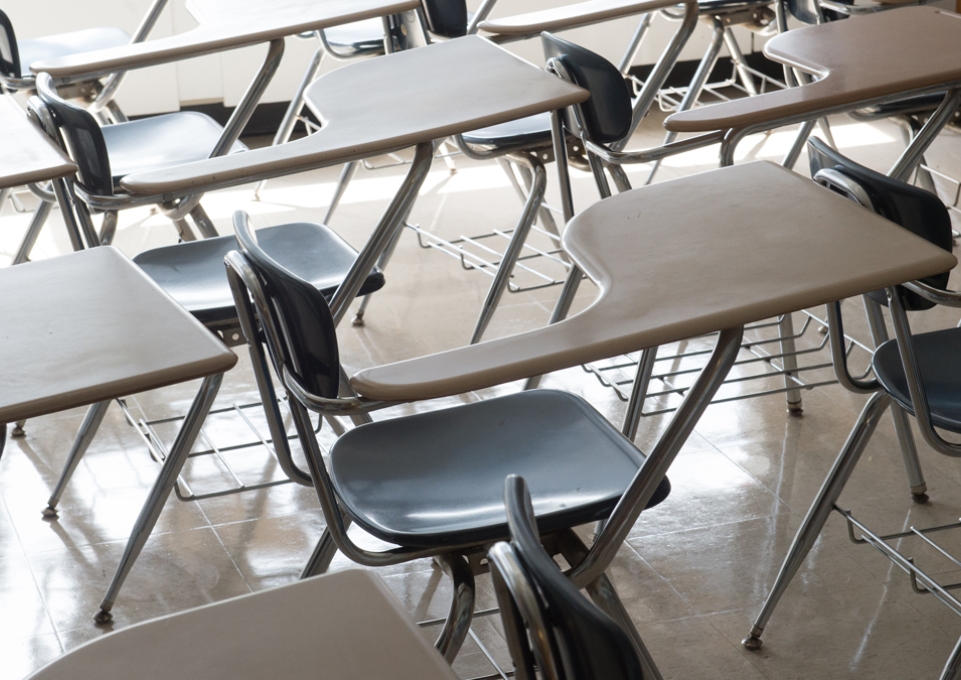 Empty desks in a classroom