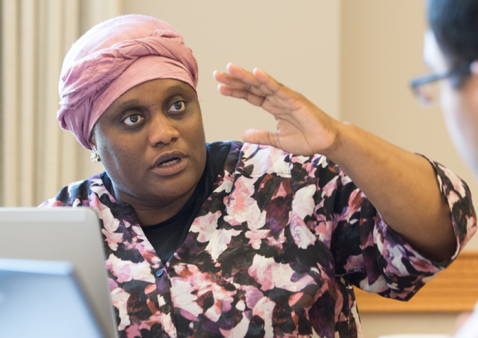 Atta Ceesay talking and gesturing with hand